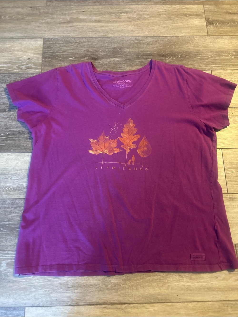 Life Is Good Women's Short Sleeve V-Neck Tee in Magenta with Orange Leaf Graphic